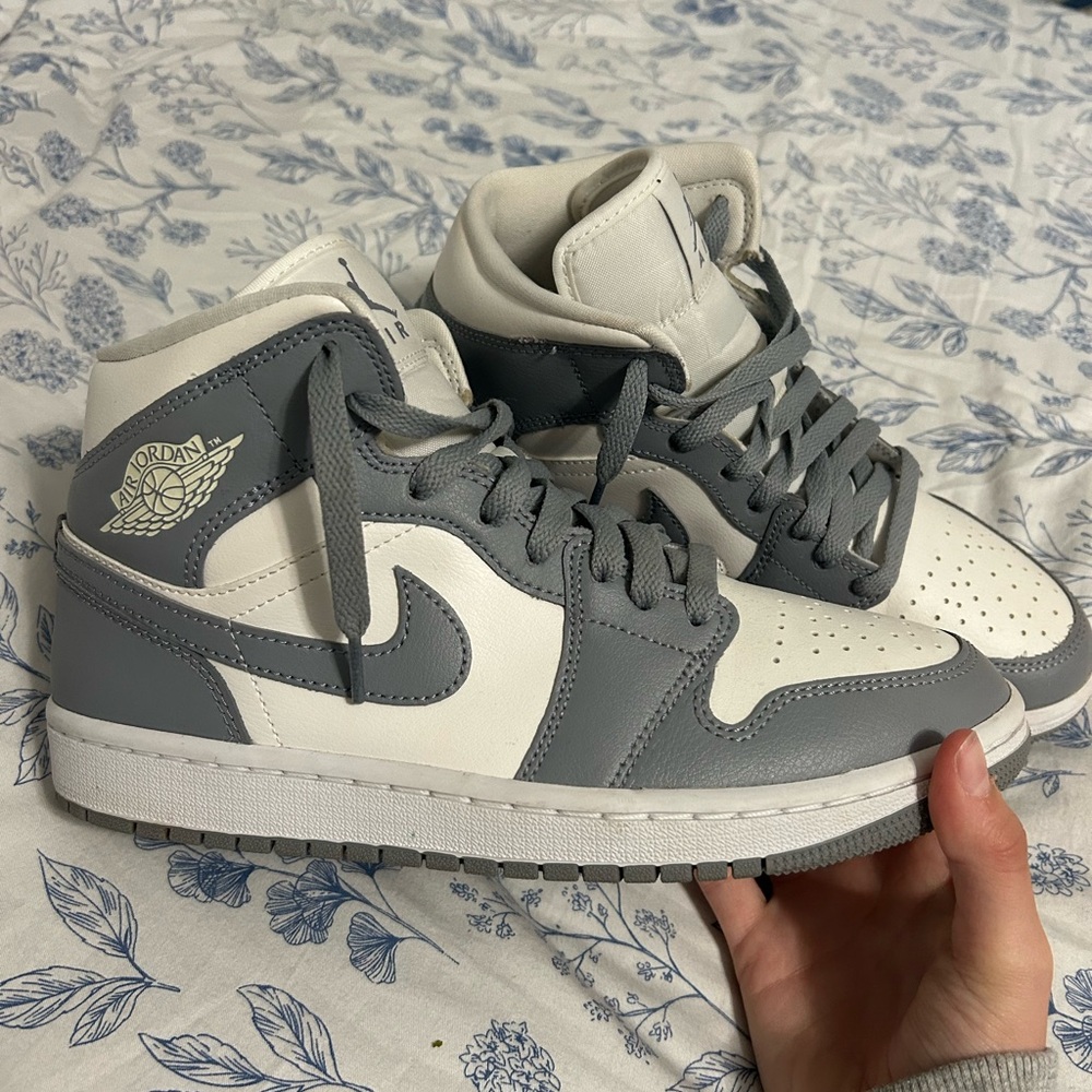 Nike grey and white womens size 8.5 Jordan mids.